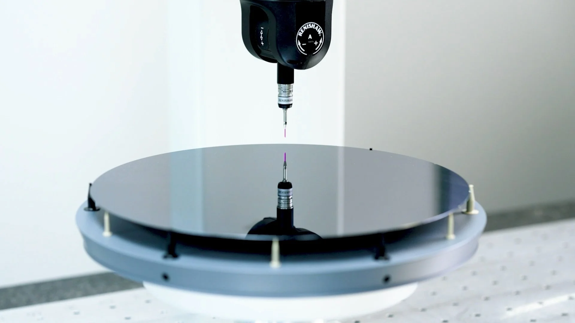 Precision measurement probe scanning a polished wafer, frame from the ESP Spares banner video